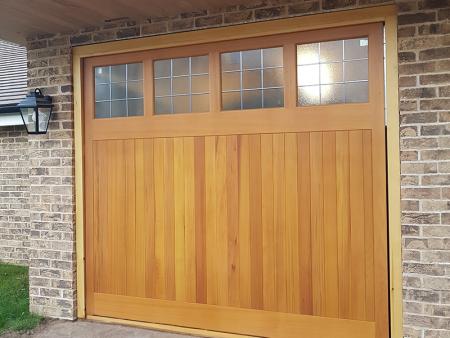 Cedarwood single up and over in light oak with leaded light windows.